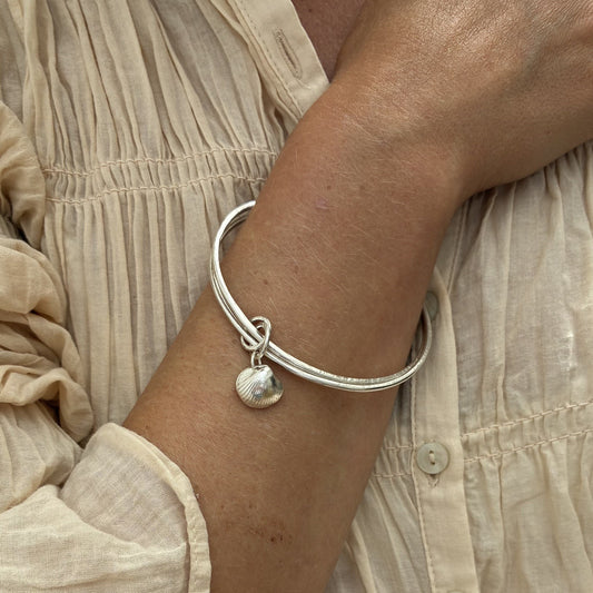 Large double sterling silver bangle with fine silver shell charm