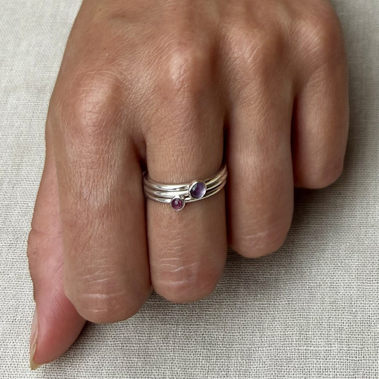 Three stacking rings with amethyst and tourmaline